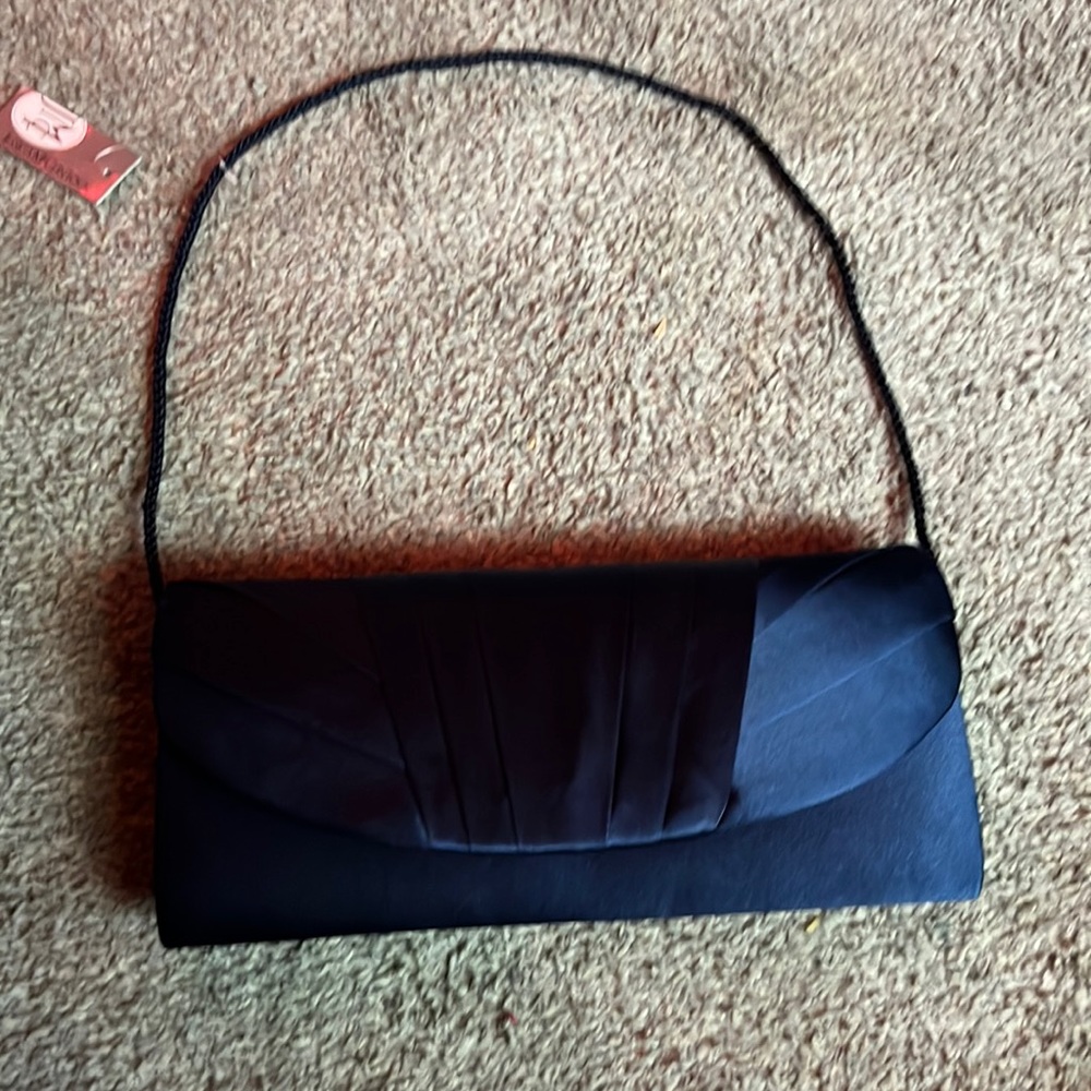 This is a navy blue purse it is brand new